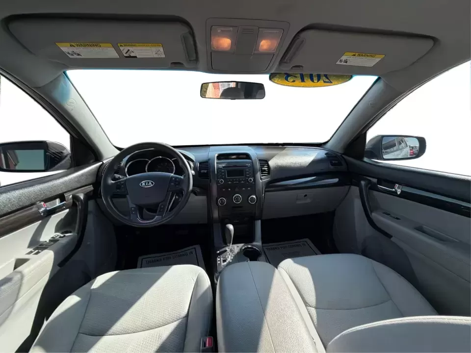 2013 Kia Sorento LX (5XYKT3A12DG) with an 2.4L I-4 DOHC engine, 6-Speed Automatic transmission, located at 8750 N County Rd 25A, Piqua, OH, 45356, (937) 908-9800, 40.164391, -84.232513 - Need one SUV that can handle the school run, a long commute up I75, and a weekend getaway to Indian Lake without blowing your budget? This 2013 Kia Sorento LX in Satin Metal is a practical, road-trip-ready SUV that's sized for real life-easy to park, comfortable for passengers, and versatile enough - Photo#22