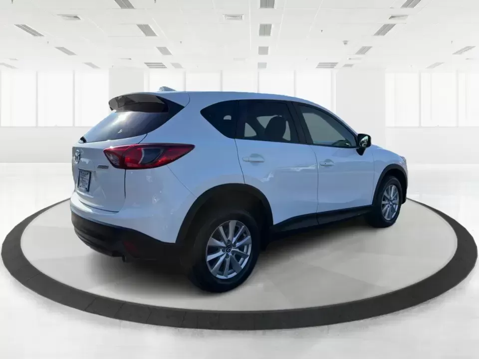 2016 Mazda CX-5 Touring (JM3KE4CYXG0) with an SKYACTIV-G 2.5L I-4 gasoline direct injection engine, 6-Speed Automatic transmission, located at 1230 East Main St, Xenia, OH, 45385, (937) 908-9800, 39.688026, -83.910172 - Pack up the kids, load the groceries, or point the nose toward a weekend road trip-this 2016 Mazda CX-5 Touring is the kind of SUV that fits real life in Piqua. With confident all-weather capability and a comfortable, well-equipped cabin, it's a smart choice for commuters running up and down I75, fa - Photo#2