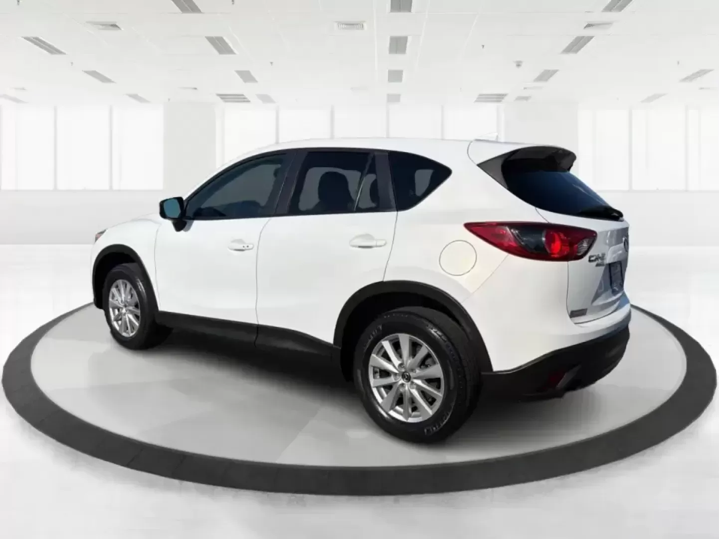 2016 Mazda CX-5 Touring (JM3KE4CYXG0) with an SKYACTIV-G 2.5L I-4 gasoline direct injection engine, 6-Speed Automatic transmission, located at 1099 N County Rd 25A , Troy, OH, 45373, (937) 908-9800, 40.057079, -84.212883 - Pack up the kids, load the groceries, or point the nose toward a weekend road trip-this 2016 Mazda CX-5 Touring is the kind of SUV that fits real life in Piqua. With confident all-weather capability and a comfortable, well-equipped cabin, it's a smart choice for commuters running up and down I75, fa - Photo#4