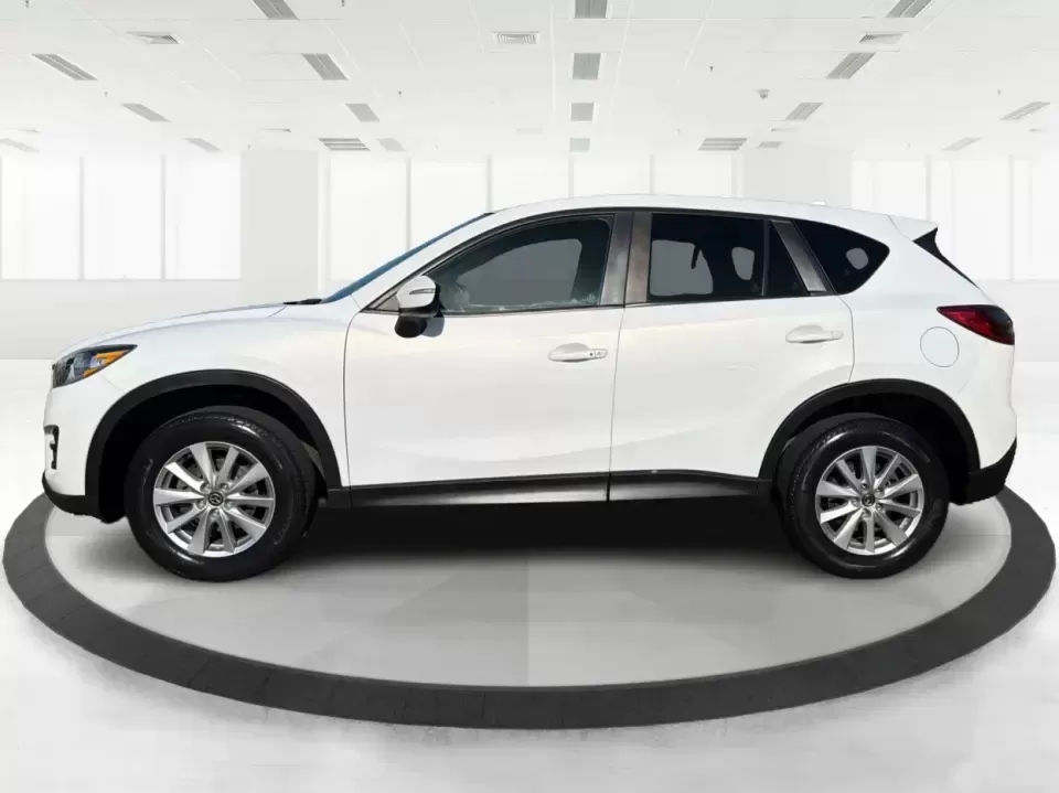 2016 Mazda CX-5 Touring (JM3KE4CYXG0) with an SKYACTIV-G 2.5L I-4 gasoline direct injection engine, 6-Speed Automatic transmission, located at 1230 East Main St, Xenia, OH, 45385, (937) 908-9800, 39.688026, -83.910172 - Pack up the kids, load the groceries, or point the nose toward a weekend road trip-this 2016 Mazda CX-5 Touring is the kind of SUV that fits real life in Piqua. With confident all-weather capability and a comfortable, well-equipped cabin, it's a smart choice for commuters running up and down I75, fa - Photo#5