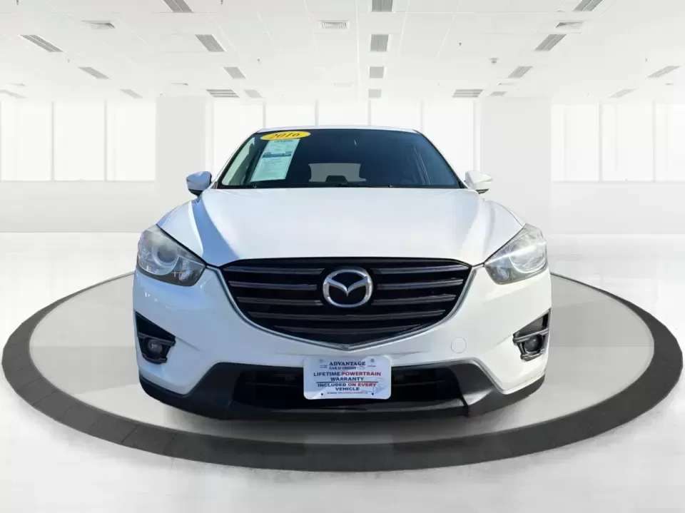 2016 Mazda CX-5 Touring (JM3KE4CYXG0) with an SKYACTIV-G 2.5L I-4 gasoline direct injection engine, 6-Speed Automatic transmission, located at 1230 East Main St, Xenia, OH, 45385, (937) 908-9800, 39.688026, -83.910172 - Pack up the kids, load the groceries, or point the nose toward a weekend road trip-this 2016 Mazda CX-5 Touring is the kind of SUV that fits real life in Piqua. With confident all-weather capability and a comfortable, well-equipped cabin, it's a smart choice for commuters running up and down I75, fa - Photo#7