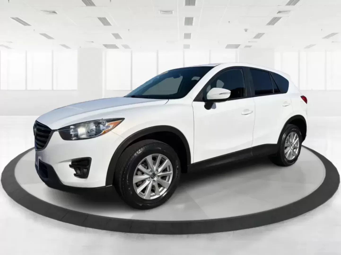 2016 Mazda CX-5 Touring (JM3KE4CYXG0) with an SKYACTIV-G 2.5L I-4 gasoline direct injection engine, 6-Speed Automatic transmission, located at 1099 N County Rd 25A , Troy, OH, 45373, (937) 908-9800, 40.057079, -84.212883 - Pack up the kids, load the groceries, or point the nose toward a weekend road trip-this 2016 Mazda CX-5 Touring is the kind of SUV that fits real life in Piqua. With confident all-weather capability and a comfortable, well-equipped cabin, it's a smart choice for commuters running up and down I75, fa - Photo#8