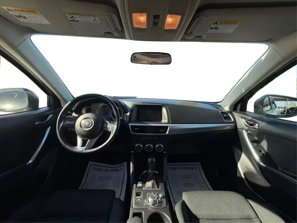 2016 Mazda CX-5 Touring (JM3KE4CYXG0) with an SKYACTIV-G 2.5L I-4 gasoline direct injection engine, 6-Speed Automatic transmission, located at 1230 East Main St, Xenia, OH, 45385, (937) 908-9800, 39.688026, -83.910172 - Pack up the kids, load the groceries, or point the nose toward a weekend road trip-this 2016 Mazda CX-5 Touring is the kind of SUV that fits real life in Piqua. With confident all-weather capability and a comfortable, well-equipped cabin, it's a smart choice for commuters running up and down I75, fa - Photo#21