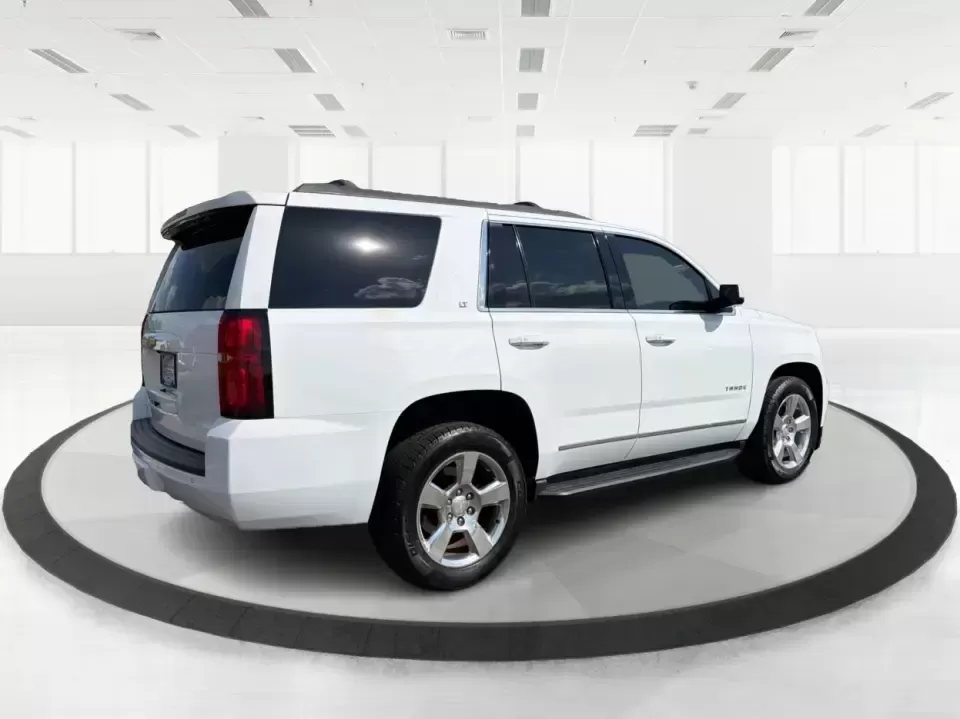 2016 Chevrolet Tahoe LT (1GNSKBKC8GR) with an EcoTec3 5.3L V-8 gasoline direct injection engine, 6A transmission, located at 8750 N County Rd 25A, Piqua, OH, 45356, (937) 908-9800, 40.164391, -84.232513 - If your weekends look like youth sports in the morning, a grocery run in the afternoon, and a last-minute road trip after dinner, this 2016 Chevrolet Tahoe LT 4WD is the kind of full-size SUV that keeps up with real life in Piqua. Finished in Summit White and built for comfort, capability, and confi - Photo#2