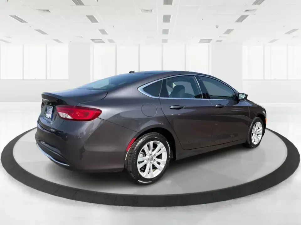 2015 Chrysler 200 Limited (1C3CCCAB6FN) with an 2.4L L4 DOHC 16V engine, 9-Speed Automatic transmission, located at 1099 N County Rd 25A , Troy, OH, 45373, (937) 908-9800, 40.057079, -84.212883 - Picture your next week: an easy I-75 commute, a comfortable run to Meijer, and a weekend cruise past the Miami County Fairgrounds-without stressing about how you'll get approved. This 2015 Chrysler 200 Limited is built for real life in Troy, Ohio: smooth, quiet, and efficient enough for daily drivin - Photo#2