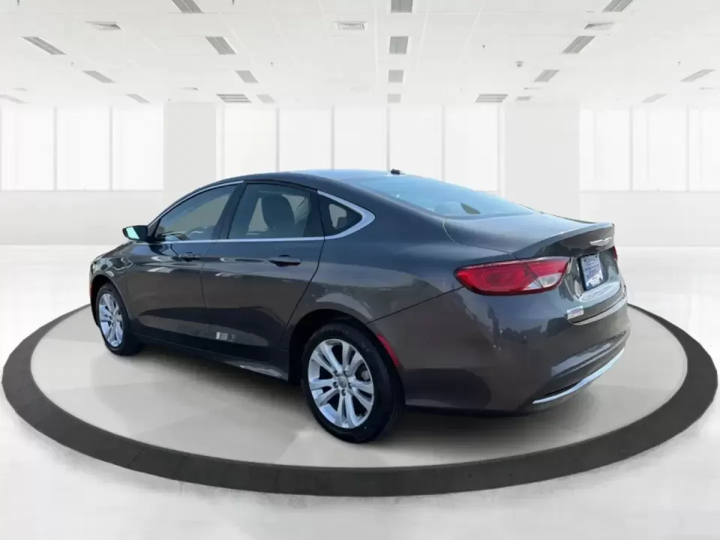 2015 Chrysler 200 Limited (1C3CCCAB6FN) with an 2.4L L4 DOHC 16V engine, 9-Speed Automatic transmission, located at 1099 N County Rd 25A , Troy, OH, 45373, (937) 908-9800, 40.057079, -84.212883 - Picture your next week: an easy I-75 commute, a comfortable run to Meijer, and a weekend cruise past the Miami County Fairgrounds-without stressing about how you'll get approved. This 2015 Chrysler 200 Limited is built for real life in Troy, Ohio: smooth, quiet, and efficient enough for daily drivin - Photo#4