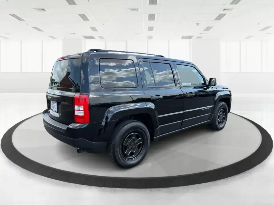 2014 Jeep Patriot Sport (1C4NJPBB0ED) with an 2.4L L4 DOHC 16V engine, located at 880 E. National Road, Vandalia, OH, 45377, (937) 908-9800, 39.891918, -84.183594 - Weekend getaways to the MetroParks, daily commutes down I75, or school-dropoff runs around Vandalia-this 2014 Jeep Patriot Sport is built for the kind of real-life driving that mixes practicality with a little adventure. Finished in Black Clearcoat with a versatile SUV body style, it's an easy fit f - Photo#2