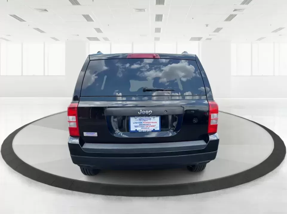 2014 Jeep Patriot Sport (1C4NJPBB0ED) with an 2.4L L4 DOHC 16V engine, located at 880 E. National Road, Vandalia, OH, 45377, (937) 908-9800, 39.891918, -84.183594 - Weekend getaways to the MetroParks, daily commutes down I75, or school-dropoff runs around Vandalia-this 2014 Jeep Patriot Sport is built for the kind of real-life driving that mixes practicality with a little adventure. Finished in Black Clearcoat with a versatile SUV body style, it's an easy fit f - Photo#3