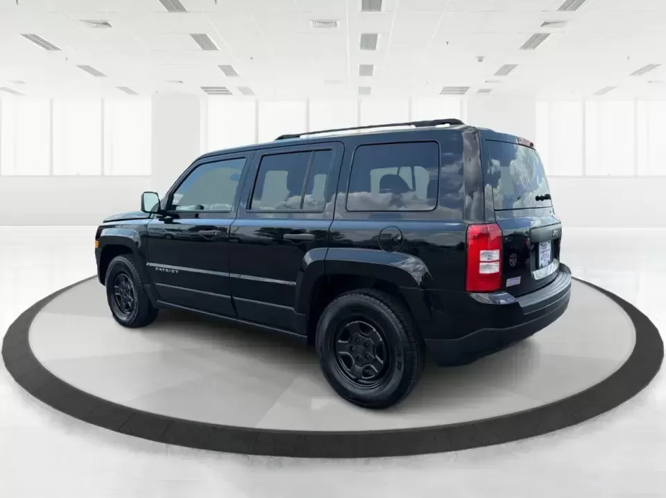 2014 Jeep Patriot Sport (1C4NJPBB0ED) with an 2.4L L4 DOHC 16V engine, located at 880 E. National Road, Vandalia, OH, 45377, (937) 908-9800, 39.891918, -84.183594 - Weekend getaways to the MetroParks, daily commutes down I75, or school-dropoff runs around Vandalia-this 2014 Jeep Patriot Sport is built for the kind of real-life driving that mixes practicality with a little adventure. Finished in Black Clearcoat with a versatile SUV body style, it's an easy fit f - Photo#4