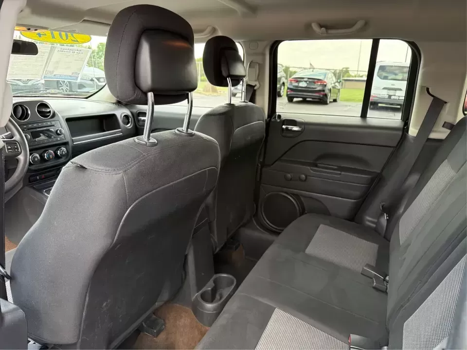 2014 Jeep Patriot Sport (1C4NJPBB0ED) with an 2.4L L4 DOHC 16V engine, located at 880 E. National Road, Vandalia, OH, 45377, (937) 908-9800, 39.891918, -84.183594 - Weekend getaways to the MetroParks, daily commutes down I75, or school-dropoff runs around Vandalia-this 2014 Jeep Patriot Sport is built for the kind of real-life driving that mixes practicality with a little adventure. Finished in Black Clearcoat with a versatile SUV body style, it's an easy fit f - Photo#10