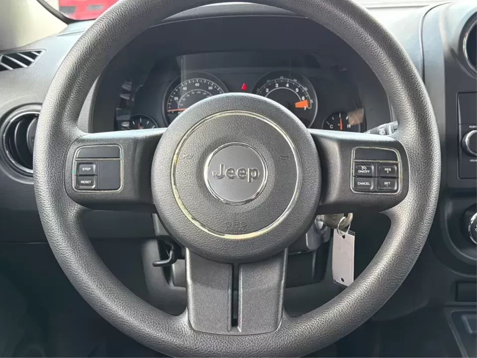 2014 Jeep Patriot Sport (1C4NJPBB0ED) with an 2.4L L4 DOHC 16V engine, located at 880 E. National Road, Vandalia, OH, 45377, (937) 908-9800, 39.891918, -84.183594 - Weekend getaways to the MetroParks, daily commutes down I75, or school-dropoff runs around Vandalia-this 2014 Jeep Patriot Sport is built for the kind of real-life driving that mixes practicality with a little adventure. Finished in Black Clearcoat with a versatile SUV body style, it's an easy fit f - Photo#16