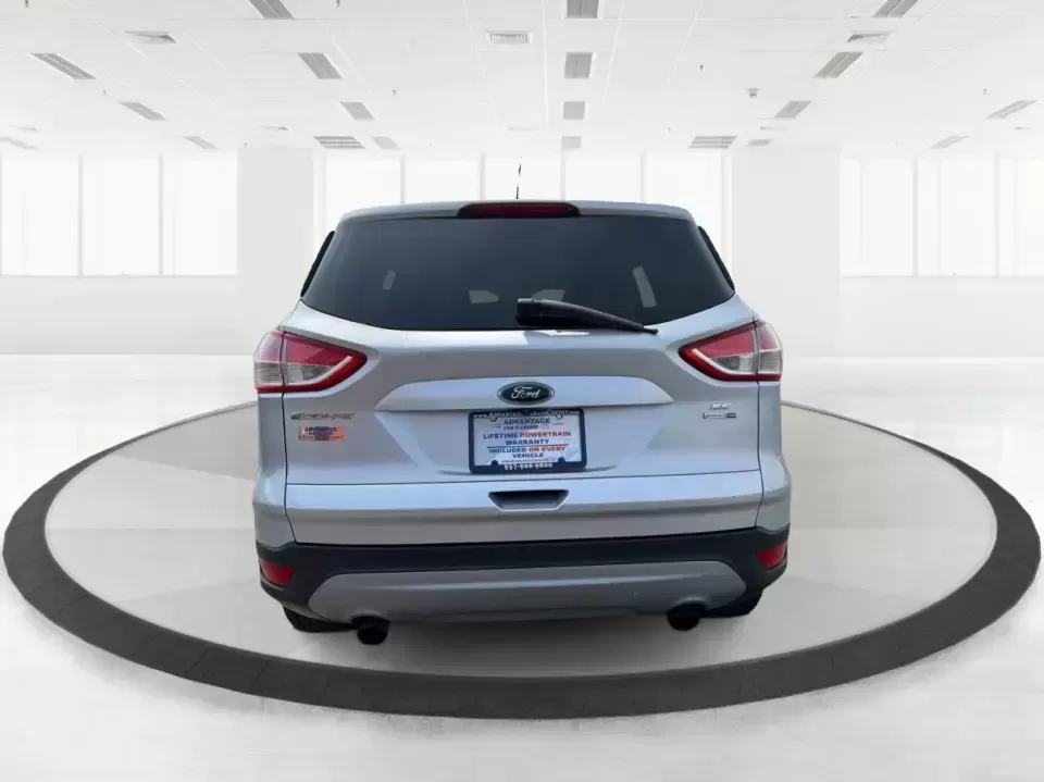 2015 Ford Escape SE (1FMCU9G98FU) with an 2.0L L4 DOHC 16V engine, 6-Speed Automatic transmission, located at 1099 N County Rd 25A , Troy, OH, 45373, (937) 908-9800, 40.057079, -84.212883 - Weekday commutes down I75, school drop-offs around Troy City Schools, and spontaneous weekend trips to Charleston Falls Preserve all get easier when you have an SUV that's the right size, the right power, and the right fit for your budget. This 2015 Ford Escape SE in Ingot Silver is built for real-l - Photo#3