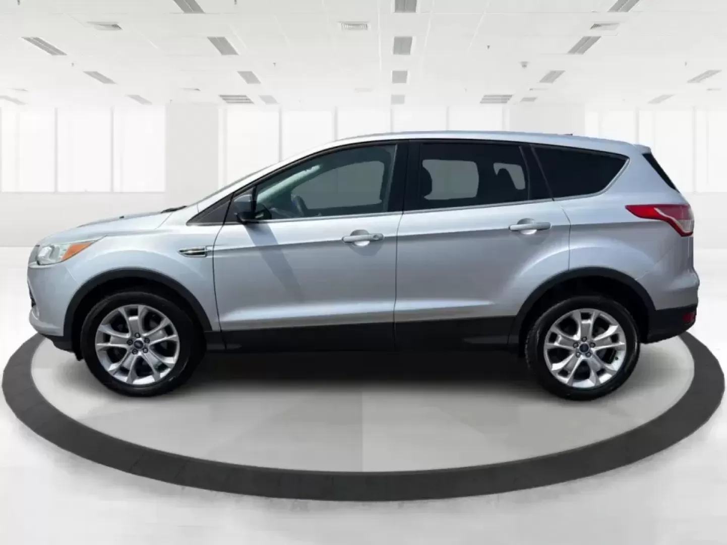 2015 Ford Escape SE (1FMCU9G98FU) with an 2.0L L4 DOHC 16V engine, 6-Speed Automatic transmission, located at 1099 N County Rd 25A , Troy, OH, 45373, (937) 908-9800, 40.057079, -84.212883 - Weekday commutes down I75, school drop-offs around Troy City Schools, and spontaneous weekend trips to Charleston Falls Preserve all get easier when you have an SUV that's the right size, the right power, and the right fit for your budget. This 2015 Ford Escape SE in Ingot Silver is built for real-l - Photo#5
