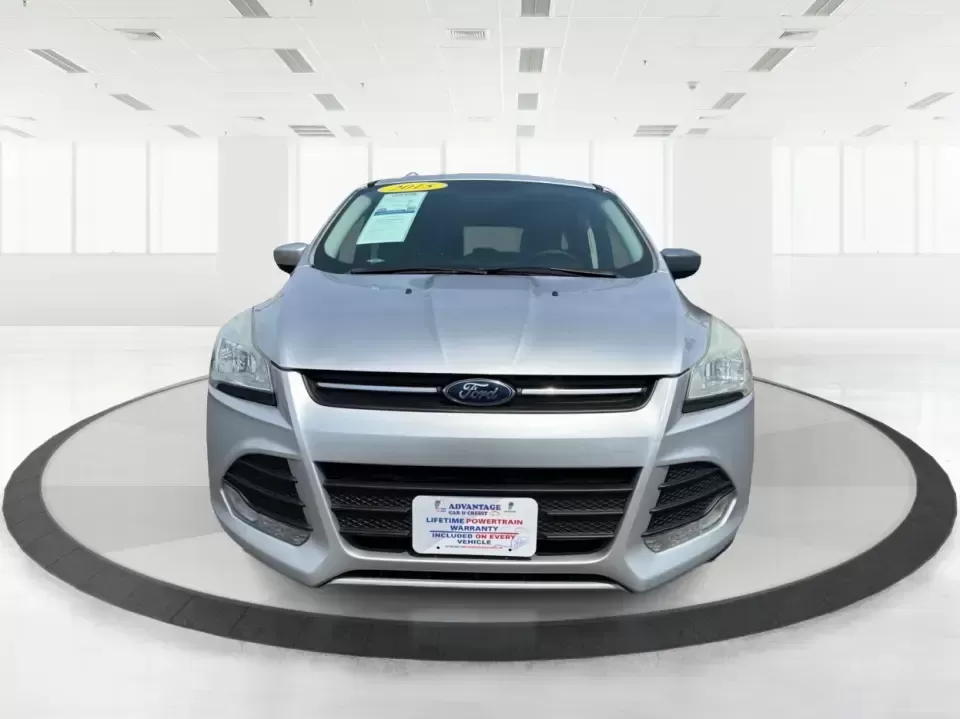 2015 Ford Escape SE (1FMCU9G98FU) with an 2.0L L4 DOHC 16V engine, 6-Speed Automatic transmission, located at 1099 N County Rd 25A , Troy, OH, 45373, (937) 908-9800, 40.057079, -84.212883 - Weekday commutes down I75, school drop-offs around Troy City Schools, and spontaneous weekend trips to Charleston Falls Preserve all get easier when you have an SUV that's the right size, the right power, and the right fit for your budget. This 2015 Ford Escape SE in Ingot Silver is built for real-l - Photo#7