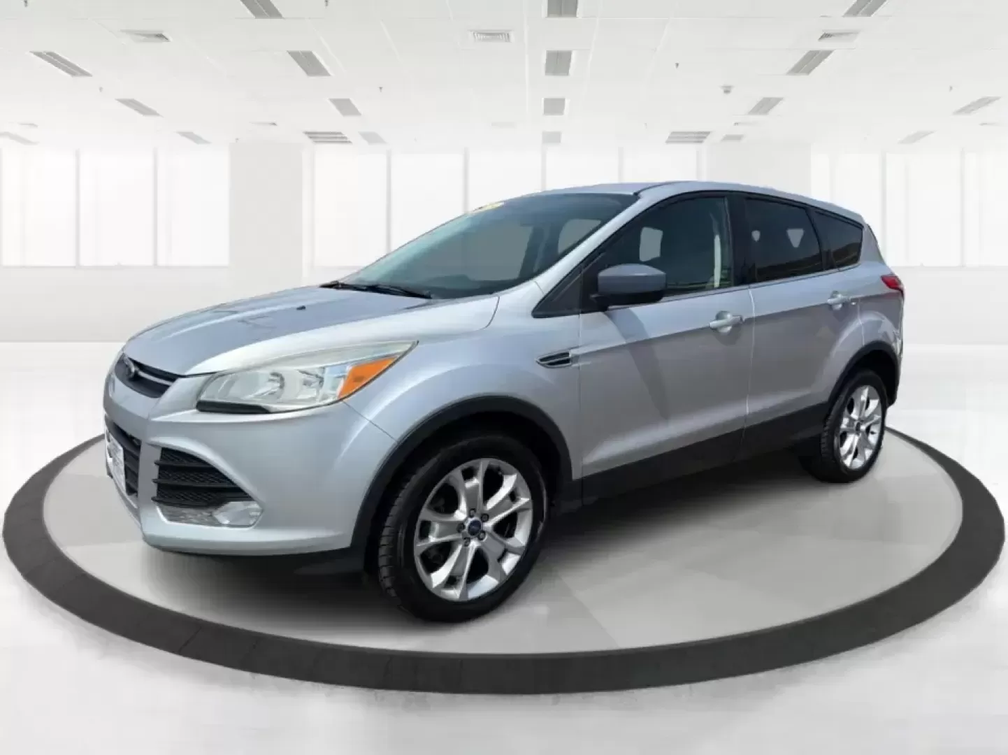 2015 Ford Escape SE (1FMCU9G98FU) with an 2.0L L4 DOHC 16V engine, 6-Speed Automatic transmission, located at 1099 N County Rd 25A , Troy, OH, 45373, (937) 908-9800, 40.057079, -84.212883 - Weekday commutes down I75, school drop-offs around Troy City Schools, and spontaneous weekend trips to Charleston Falls Preserve all get easier when you have an SUV that's the right size, the right power, and the right fit for your budget. This 2015 Ford Escape SE in Ingot Silver is built for real-l - Photo#8