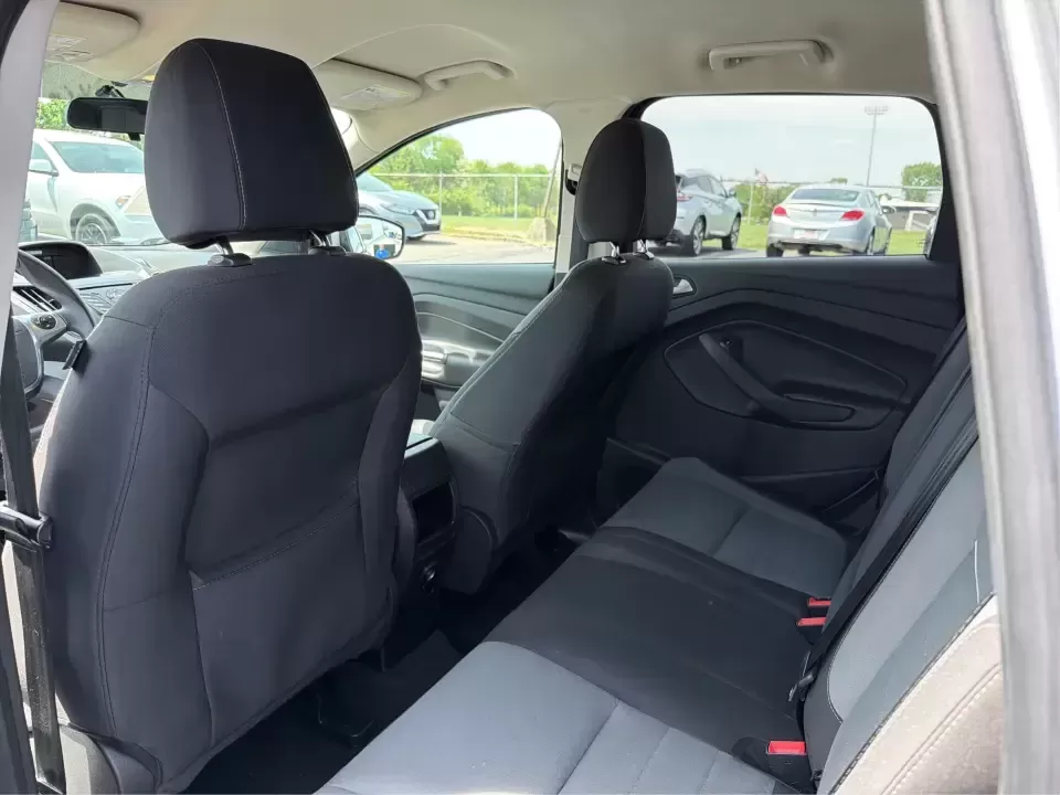 2015 Ford Escape SE (1FMCU9G98FU) with an 2.0L L4 DOHC 16V engine, 6-Speed Automatic transmission, located at 1099 N County Rd 25A , Troy, OH, 45373, (937) 908-9800, 40.057079, -84.212883 - Weekday commutes down I75, school drop-offs around Troy City Schools, and spontaneous weekend trips to Charleston Falls Preserve all get easier when you have an SUV that's the right size, the right power, and the right fit for your budget. This 2015 Ford Escape SE in Ingot Silver is built for real-l - Photo#10