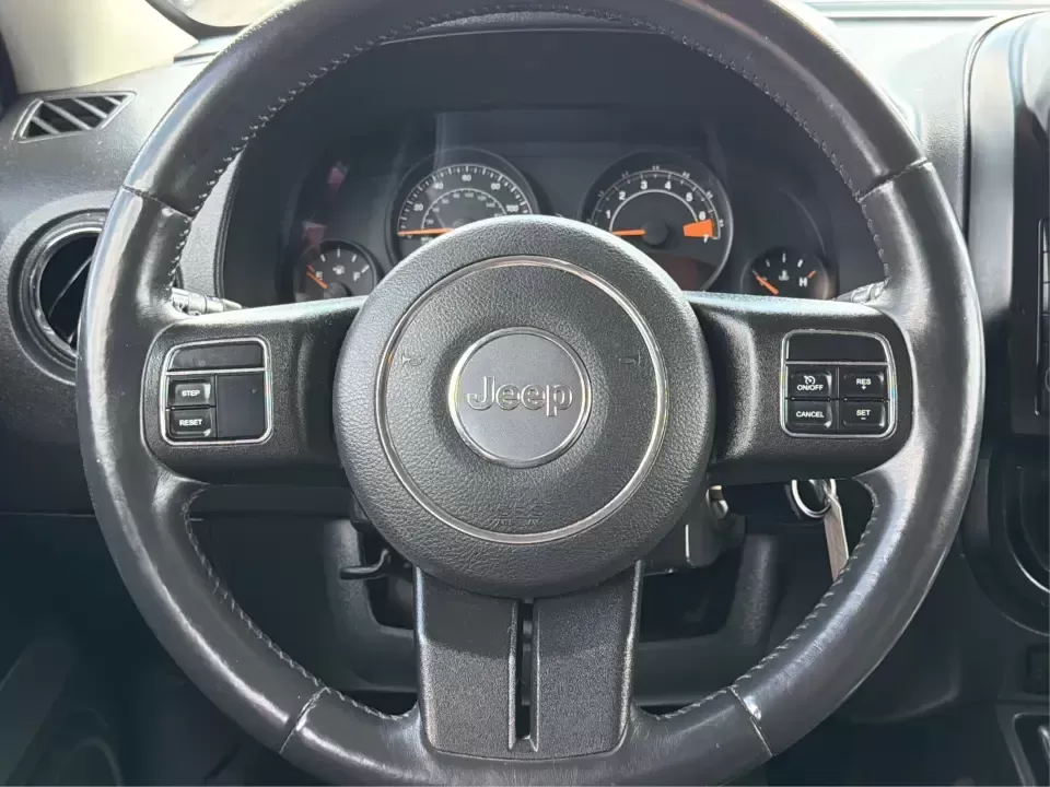 2016 Jeep Patriot Latitude (1C4NJRFB0GD) with an 2.4L I-4 DOHC engine, located at 8750 N County Rd 25A, Piqua, OH, 45356, (937) 908-9800, 40.164391, -84.232513 - Weekend escapes to Indian Lake, snowy morning commutes up I75, or everyday school-and-grocery runs around Miami County-this 2016 Jeep Patriot Latitude is built for the kind of Ohio life that doesn't slow down when the weather turns. With confident 4WD/AWD capability and SUV practicality, it's a smar - Photo#16