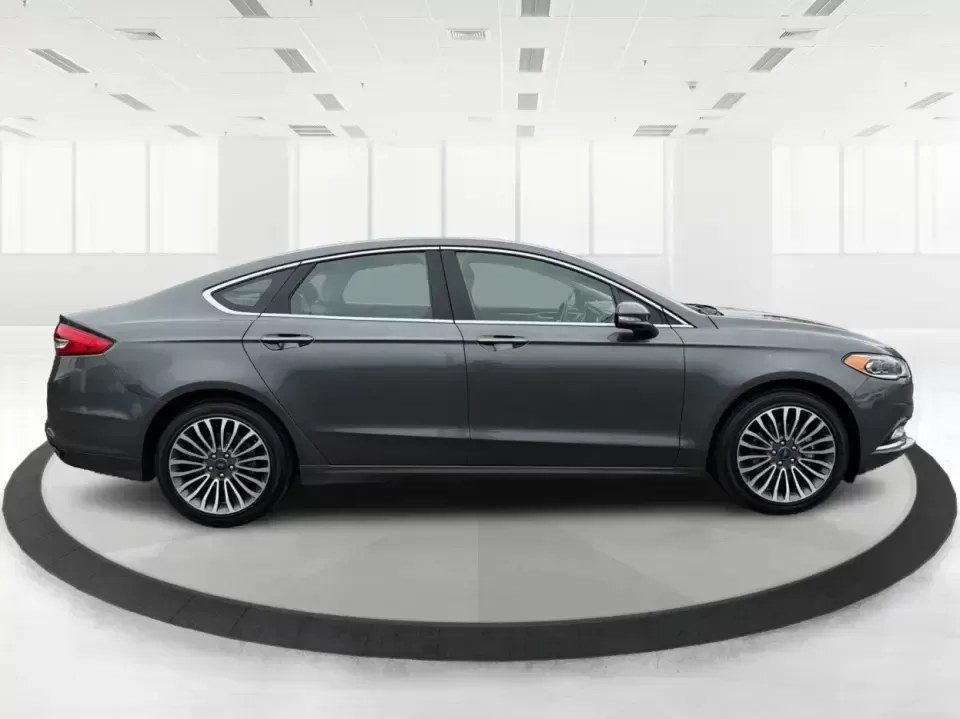 2017 Ford Fusion SE (3FA6P0H98HR) with an 2.0L L4 DOHC 16V engine, 6A transmission, located at 4508 South Dixie Dr, Moraine, OH, 45439, (937) 908-9800, 39.689976, -84.218452 - Picture your next week: a smooth, quiet commute down South Dixie Drive, quick errands to the Dayton Mall area, and a comfortable weekend drive toward Carillon Historical Park or a Reds day trip-without feeling like you're overpaying for a sedan that can't keep up. This 2017 Ford Fusion SE in sleek M - Photo#1
