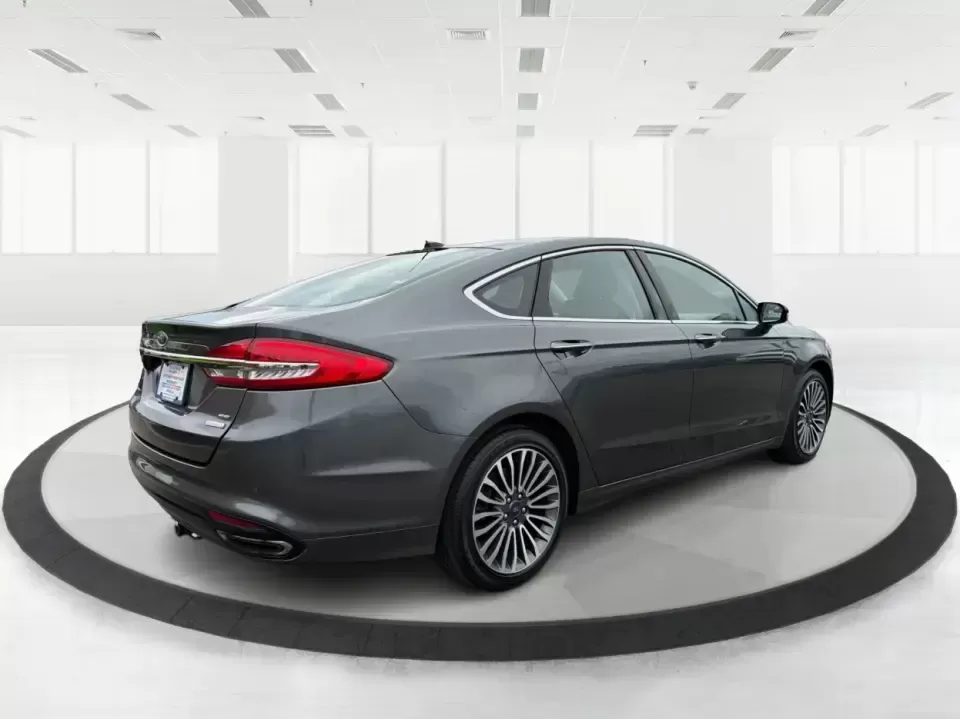 2017 Ford Fusion SE (3FA6P0H98HR) with an 2.0L L4 DOHC 16V engine, 6A transmission, located at 4508 South Dixie Dr, Moraine, OH, 45439, (937) 908-9800, 39.689976, -84.218452 - Picture your next week: a smooth, quiet commute down South Dixie Drive, quick errands to the Dayton Mall area, and a comfortable weekend drive toward Carillon Historical Park or a Reds day trip-without feeling like you're overpaying for a sedan that can't keep up. This 2017 Ford Fusion SE in sleek M - Photo#2