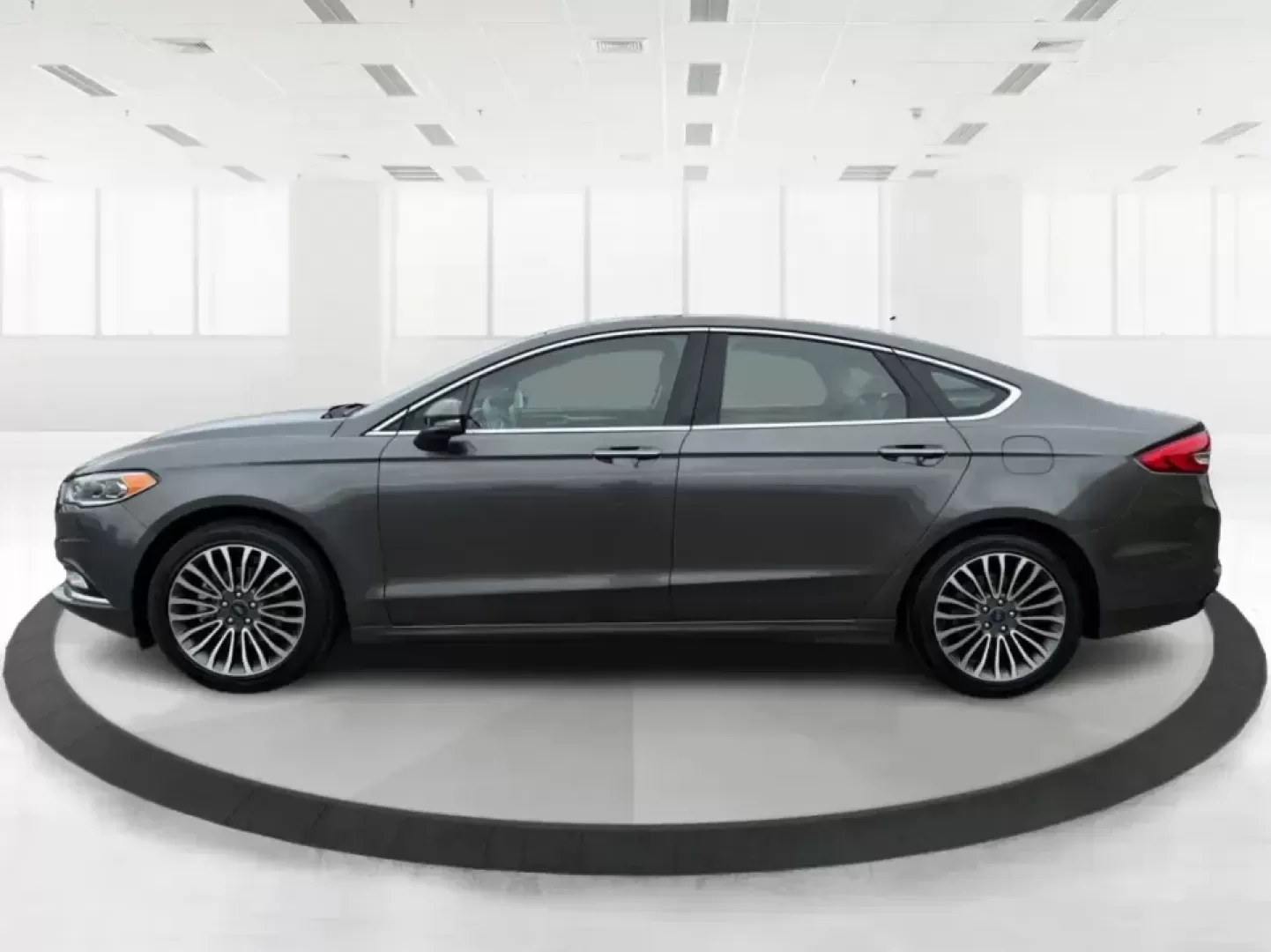 2017 Ford Fusion SE (3FA6P0H98HR) with an 2.0L L4 DOHC 16V engine, 6A transmission, located at 4508 South Dixie Dr, Moraine, OH, 45439, (937) 908-9800, 39.689976, -84.218452 - Picture your next week: a smooth, quiet commute down South Dixie Drive, quick errands to the Dayton Mall area, and a comfortable weekend drive toward Carillon Historical Park or a Reds day trip-without feeling like you're overpaying for a sedan that can't keep up. This 2017 Ford Fusion SE in sleek M - Photo#5
