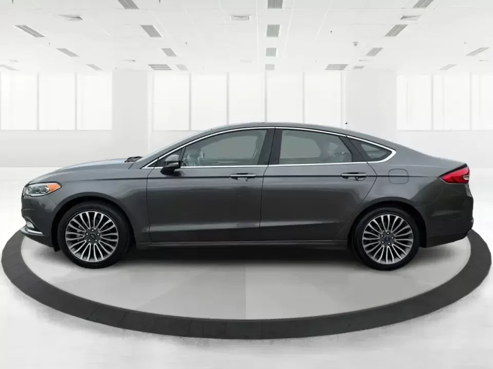 2017 Ford Fusion SE (3FA6P0H98HR) with an 2.0L L4 DOHC 16V engine, 6A transmission, located at 4508 South Dixie Dr, Moraine, OH, 45439, (937) 908-9800, 39.689976, -84.218452 - Picture your next week: a smooth, quiet commute down South Dixie Drive, quick errands to the Dayton Mall area, and a comfortable weekend drive toward Carillon Historical Park or a Reds day trip-without feeling like you're overpaying for a sedan that can't keep up. This 2017 Ford Fusion SE in sleek M - Photo#5