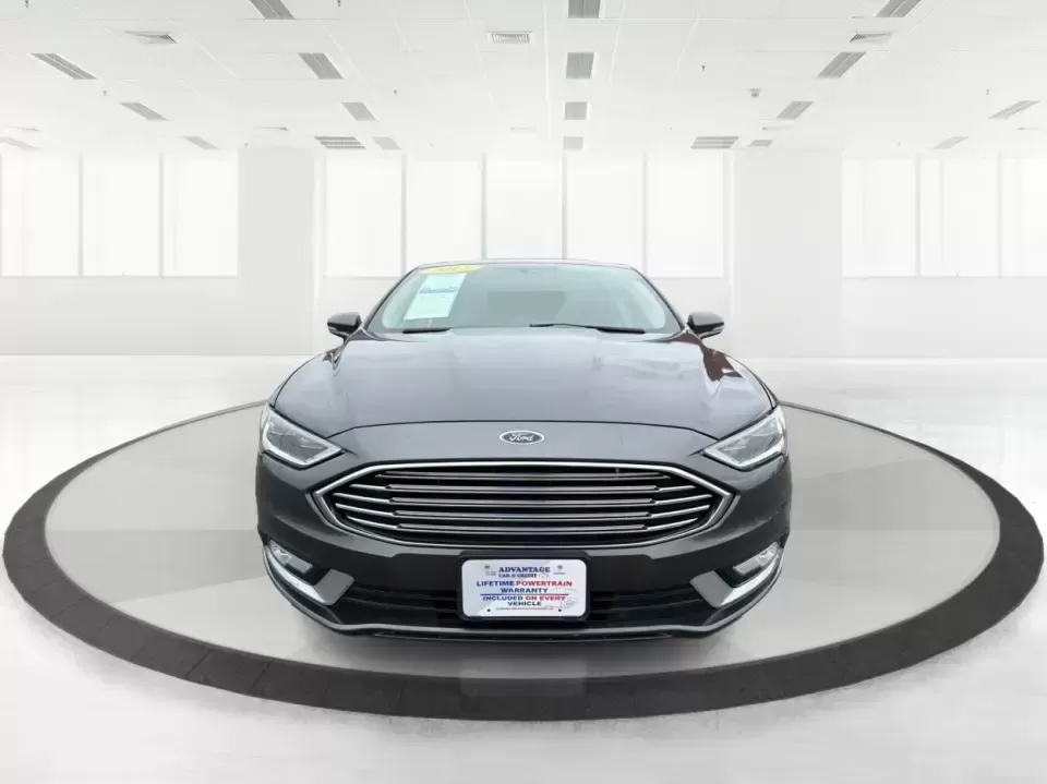 2017 Ford Fusion SE (3FA6P0H98HR) with an 2.0L L4 DOHC 16V engine, 6A transmission, located at 4508 South Dixie Dr, Moraine, OH, 45439, (937) 908-9800, 39.689976, -84.218452 - Picture your next week: a smooth, quiet commute down South Dixie Drive, quick errands to the Dayton Mall area, and a comfortable weekend drive toward Carillon Historical Park or a Reds day trip-without feeling like you're overpaying for a sedan that can't keep up. This 2017 Ford Fusion SE in sleek M - Photo#7