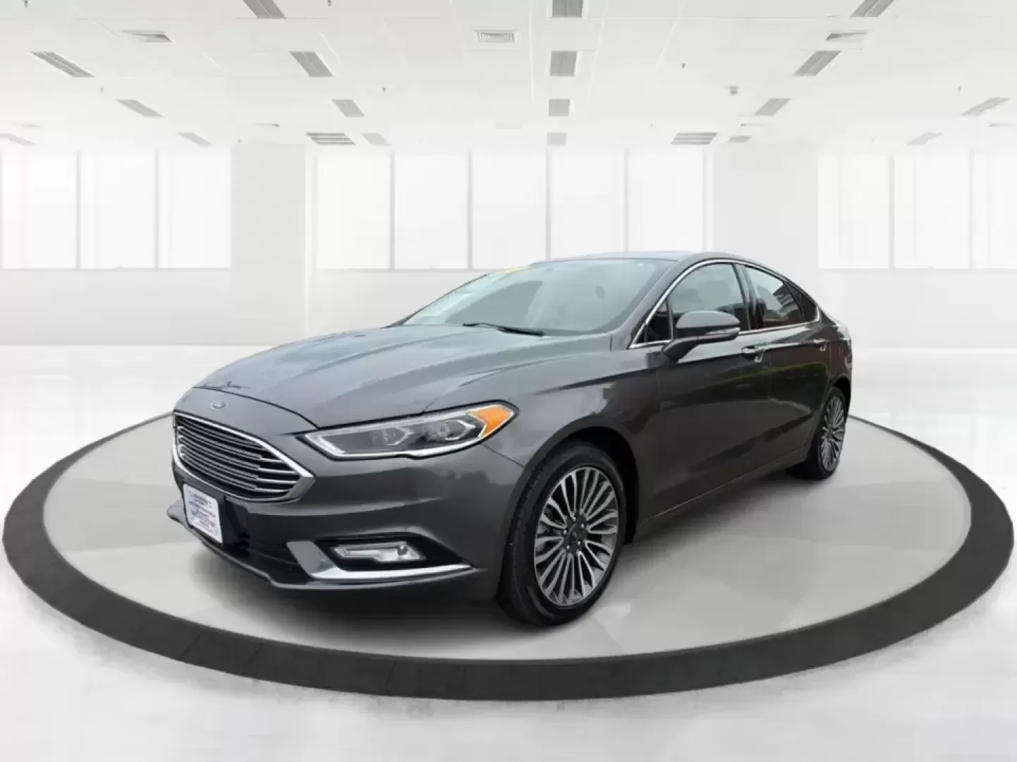 2017 Ford Fusion SE (3FA6P0H98HR) with an 2.0L L4 DOHC 16V engine, 6A transmission, located at 4508 South Dixie Dr, Moraine, OH, 45439, (937) 908-9800, 39.689976, -84.218452 - Picture your next week: a smooth, quiet commute down South Dixie Drive, quick errands to the Dayton Mall area, and a comfortable weekend drive toward Carillon Historical Park or a Reds day trip-without feeling like you're overpaying for a sedan that can't keep up. This 2017 Ford Fusion SE in sleek M - Photo#8