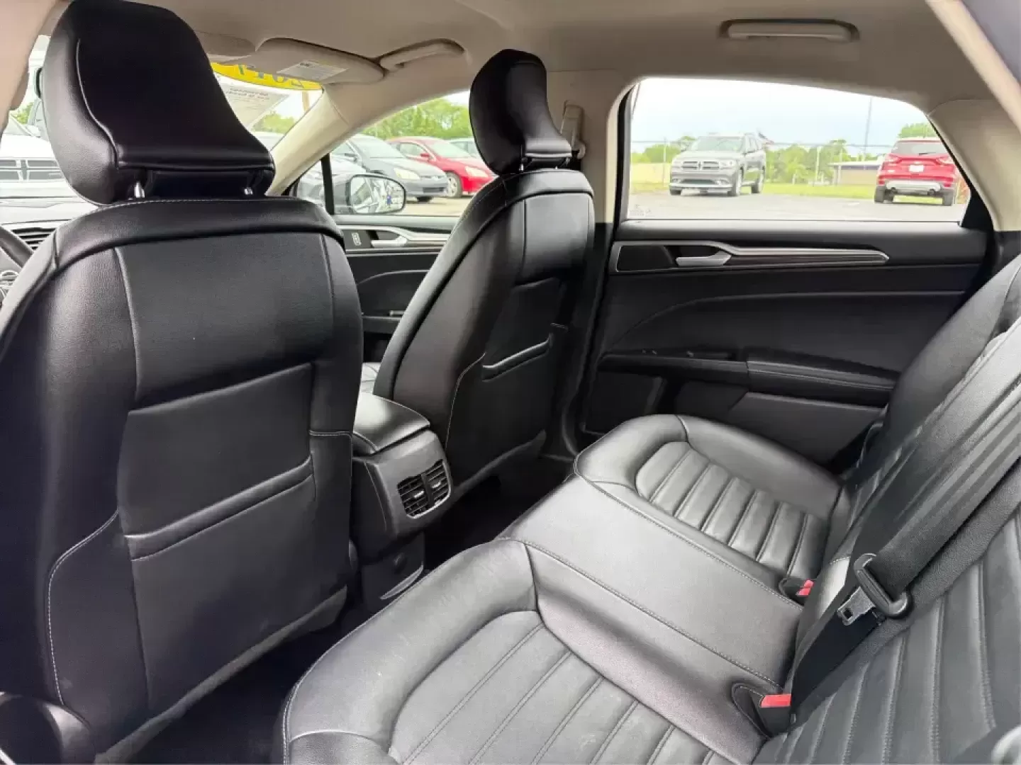 2017 Ford Fusion SE (3FA6P0H98HR) with an 2.0L L4 DOHC 16V engine, 6A transmission, located at 4508 South Dixie Dr, Moraine, OH, 45439, (937) 908-9800, 39.689976, -84.218452 - Picture your next week: a smooth, quiet commute down South Dixie Drive, quick errands to the Dayton Mall area, and a comfortable weekend drive toward Carillon Historical Park or a Reds day trip-without feeling like you're overpaying for a sedan that can't keep up. This 2017 Ford Fusion SE in sleek M - Photo#10