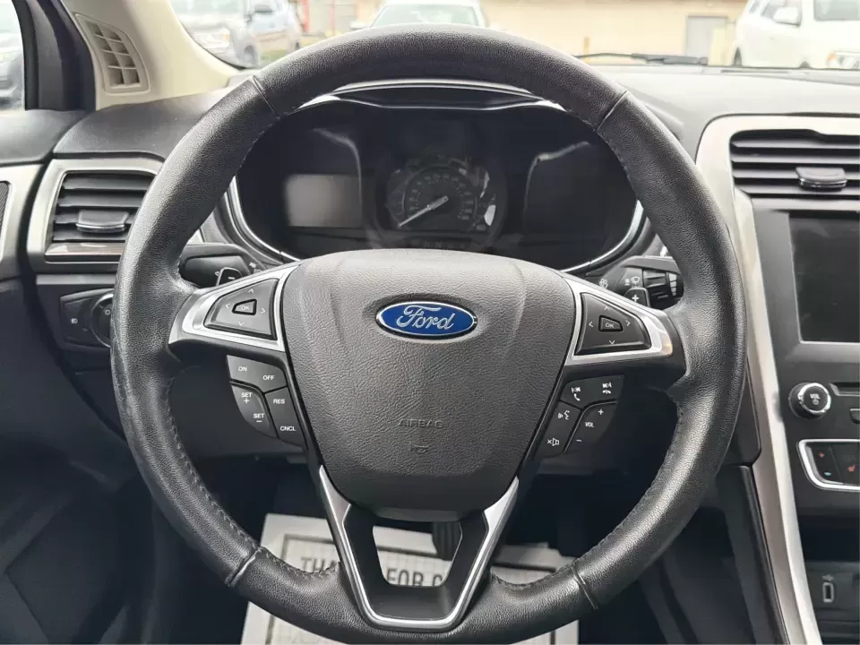 2017 Ford Fusion SE (3FA6P0H98HR) with an 2.0L L4 DOHC 16V engine, 6A transmission, located at 4508 South Dixie Dr, Moraine, OH, 45439, (937) 908-9800, 39.689976, -84.218452 - Picture your next week: a smooth, quiet commute down South Dixie Drive, quick errands to the Dayton Mall area, and a comfortable weekend drive toward Carillon Historical Park or a Reds day trip-without feeling like you're overpaying for a sedan that can't keep up. This 2017 Ford Fusion SE in sleek M - Photo#16
