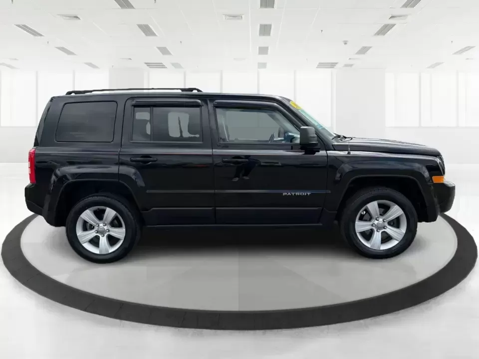 2014 Jeep Patriot Latitude (1C4NJRFB4ED) with an 2.4L I-4 DOHC engine, located at 8750 N County Rd 25A, Piqua, OH, 45356, (937) 908-9800, 40.164391, -84.232513 - Weekend adventures, winter commutes, and everyday errands feel a lot easier when you're in an SUV that's confident on Ohio backroads and comfortable in town. This **2014 Jeep Patriot Latitude 4WD** is a practical, go-anywhere choice for drivers who want Jeep capability without the full-size SUV foot - Photo#1