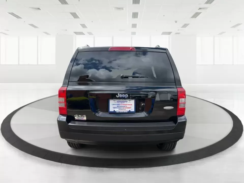2014 Jeep Patriot Latitude (1C4NJRFB4ED) with an 2.4L I-4 DOHC engine, located at 8750 N County Rd 25A, Piqua, OH, 45356, (937) 908-9800, 40.164391, -84.232513 - Weekend adventures, winter commutes, and everyday errands feel a lot easier when you're in an SUV that's confident on Ohio backroads and comfortable in town. This **2014 Jeep Patriot Latitude 4WD** is a practical, go-anywhere choice for drivers who want Jeep capability without the full-size SUV foot - Photo#3