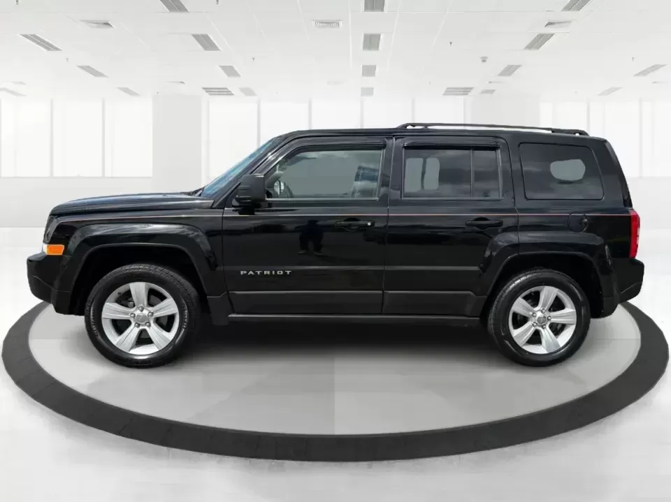 2014 Jeep Patriot Latitude (1C4NJRFB4ED) with an 2.4L I-4 DOHC engine, located at 8750 N County Rd 25A, Piqua, OH, 45356, (937) 908-9800, 40.164391, -84.232513 - Weekend adventures, winter commutes, and everyday errands feel a lot easier when you're in an SUV that's confident on Ohio backroads and comfortable in town. This **2014 Jeep Patriot Latitude 4WD** is a practical, go-anywhere choice for drivers who want Jeep capability without the full-size SUV foot - Photo#5