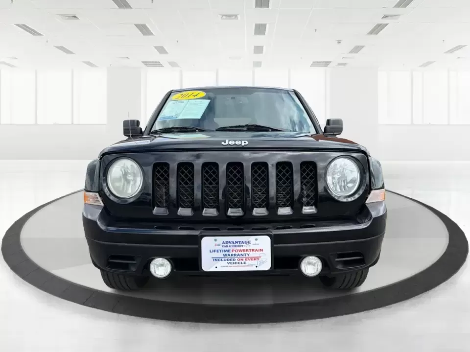 2014 Jeep Patriot Latitude (1C4NJRFB4ED) with an 2.4L I-4 DOHC engine, located at 8750 N County Rd 25A, Piqua, OH, 45356, (937) 908-9800, 40.164391, -84.232513 - Weekend adventures, winter commutes, and everyday errands feel a lot easier when you're in an SUV that's confident on Ohio backroads and comfortable in town. This **2014 Jeep Patriot Latitude 4WD** is a practical, go-anywhere choice for drivers who want Jeep capability without the full-size SUV foot - Photo#7