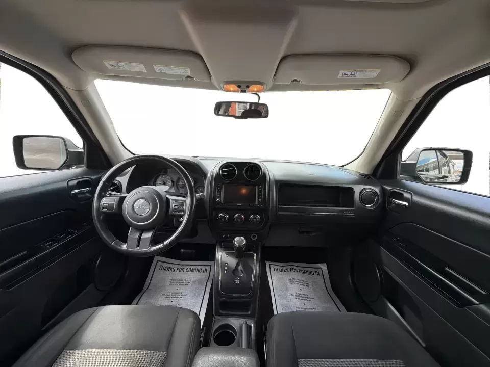 2014 Jeep Patriot Latitude (1C4NJRFB4ED) with an 2.4L I-4 DOHC engine, located at 8750 N County Rd 25A, Piqua, OH, 45356, (937) 908-9800, 40.164391, -84.232513 - Weekend adventures, winter commutes, and everyday errands feel a lot easier when you're in an SUV that's confident on Ohio backroads and comfortable in town. This **2014 Jeep Patriot Latitude 4WD** is a practical, go-anywhere choice for drivers who want Jeep capability without the full-size SUV foot - Photo#19