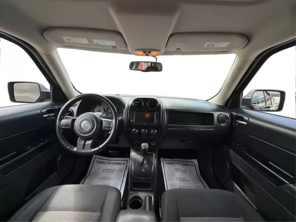 2014 Jeep Patriot Latitude (1C4NJRFB4ED) with an 2.4L I-4 DOHC engine, located at 8750 N County Rd 25A, Piqua, OH, 45356, (937) 908-9800, 40.164391, -84.232513 - Weekend adventures, winter commutes, and everyday errands feel a lot easier when you're in an SUV that's confident on Ohio backroads and comfortable in town. This **2014 Jeep Patriot Latitude 4WD** is a practical, go-anywhere choice for drivers who want Jeep capability without the full-size SUV foot - Photo#20