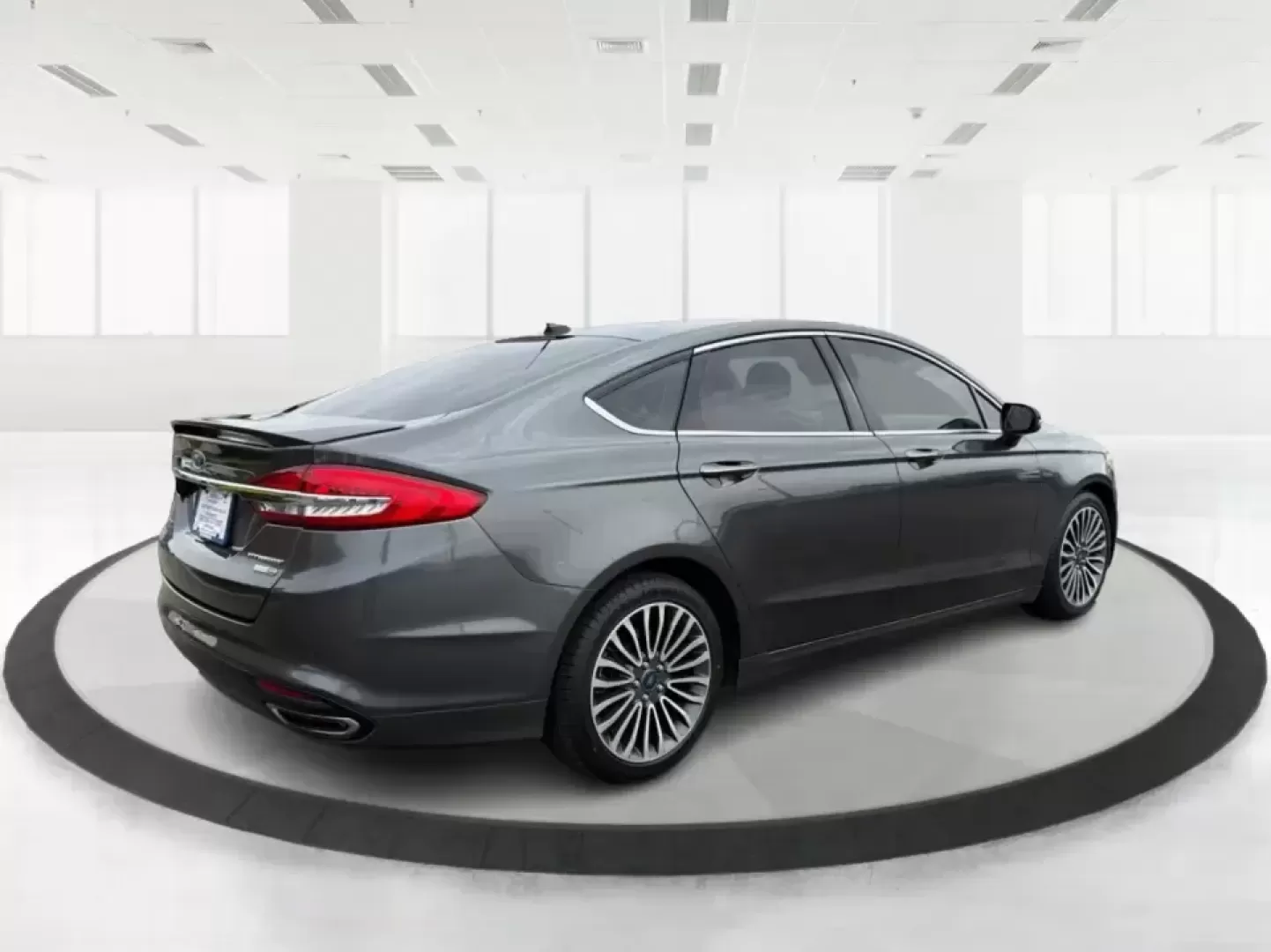 2018 Ford Fusion Titanium AWD (3FA6P0D9XJR) with an 2.0L L4 DOHC 16V engine, 6-Speed Automatic transmission, located at 8750 N County Rd 25A, Piqua, OH, 45356, (937) 908-9800, 40.164391, -84.232513 - Picture a comfortable, capable sedan that makes daily commutes down I70 feel easy, keeps weekend plans on track, and still looks sharp pulling into dinner in nearby Huber Heights or downtown Dayton. This **2018 Ford Fusion Titanium AWD** is built for real-life driving in Ohio-whether you're navigati - Photo#2