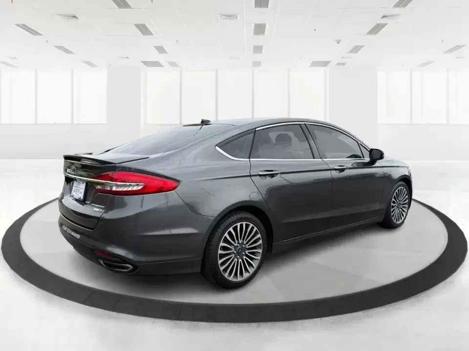 2018 Ford Fusion Titanium AWD (3FA6P0D9XJR) with an 2.0L L4 DOHC 16V engine, 6-Speed Automatic transmission, located at 1951 S Dayton Lakeview Rd., New Carlisle, OH, 45344, (937) 908-9800, 39.890999, -84.050255 - Picture a comfortable, capable sedan that makes daily commutes down I70 feel easy, keeps weekend plans on track, and still looks sharp pulling into dinner in nearby Huber Heights or downtown Dayton. This **2018 Ford Fusion Titanium AWD** is built for real-life driving in Ohio-whether you're navigati - Photo#2
