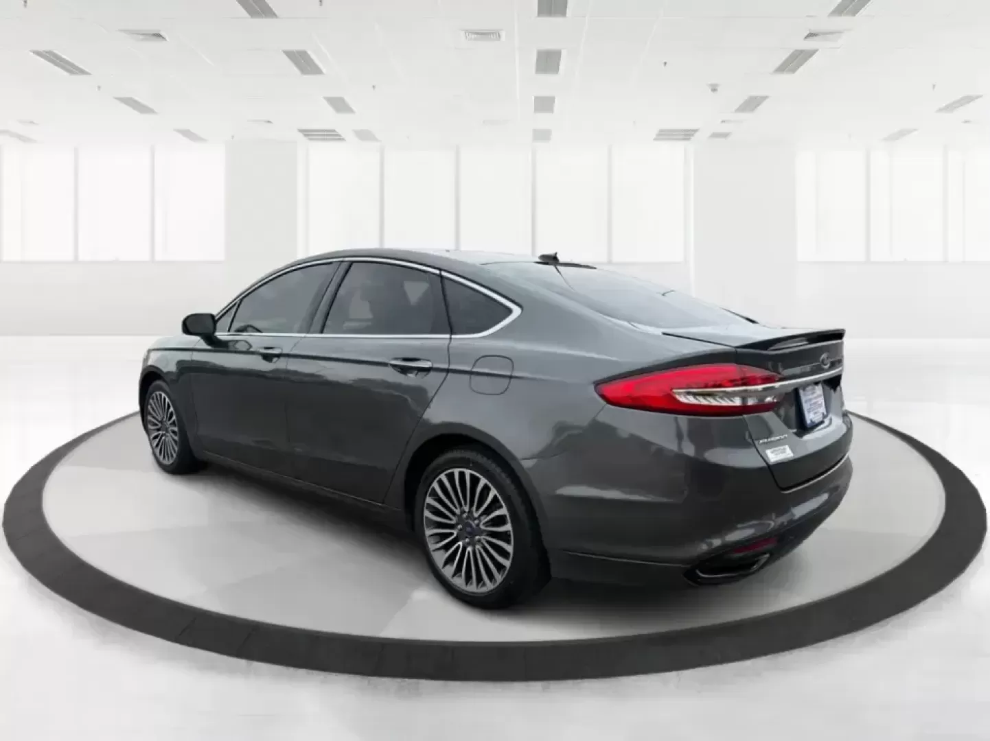 2018 Ford Fusion Titanium AWD (3FA6P0D9XJR) with an 2.0L L4 DOHC 16V engine, 6-Speed Automatic transmission, located at 8750 N County Rd 25A, Piqua, OH, 45356, (937) 908-9800, 40.164391, -84.232513 - Picture a comfortable, capable sedan that makes daily commutes down I70 feel easy, keeps weekend plans on track, and still looks sharp pulling into dinner in nearby Huber Heights or downtown Dayton. This **2018 Ford Fusion Titanium AWD** is built for real-life driving in Ohio-whether you're navigati - Photo#4