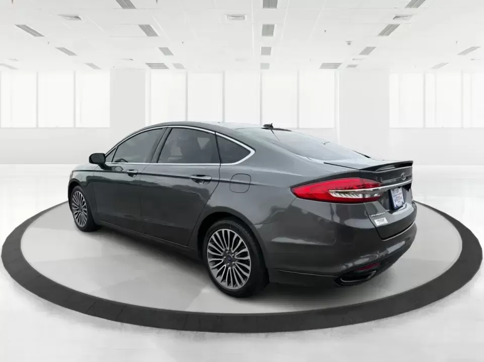 2018 Ford Fusion Titanium AWD (3FA6P0D9XJR) with an 2.0L L4 DOHC 16V engine, 6-Speed Automatic transmission, located at 1951 S Dayton Lakeview Rd., New Carlisle, OH, 45344, (937) 908-9800, 39.890999, -84.050255 - Picture a comfortable, capable sedan that makes daily commutes down I70 feel easy, keeps weekend plans on track, and still looks sharp pulling into dinner in nearby Huber Heights or downtown Dayton. This **2018 Ford Fusion Titanium AWD** is built for real-life driving in Ohio-whether you're navigati - Photo#4