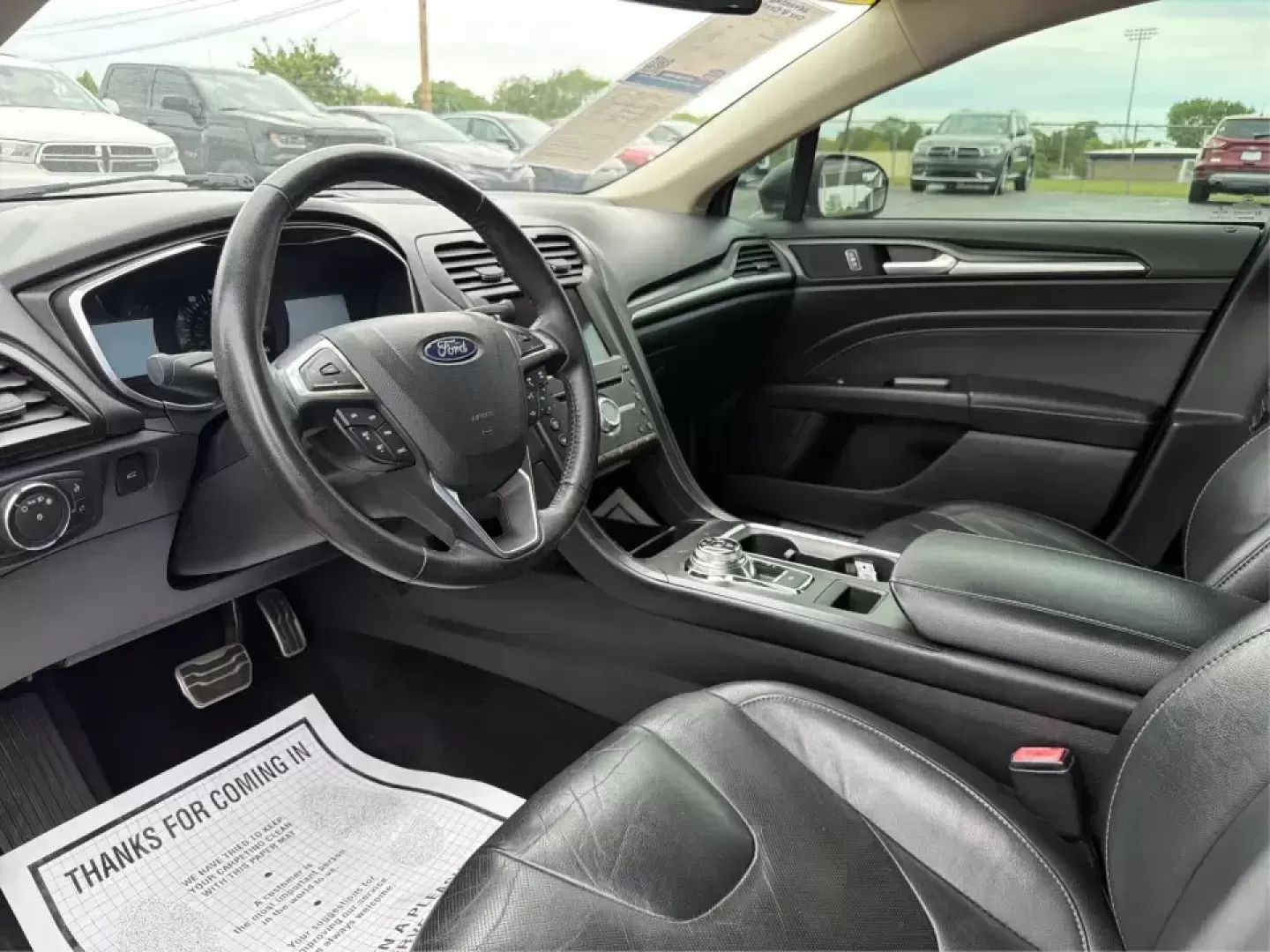 2018 Ford Fusion Titanium AWD (3FA6P0D9XJR) with an 2.0L L4 DOHC 16V engine, 6-Speed Automatic transmission, located at 8750 N County Rd 25A, Piqua, OH, 45356, (937) 908-9800, 40.164391, -84.232513 - Picture a comfortable, capable sedan that makes daily commutes down I70 feel easy, keeps weekend plans on track, and still looks sharp pulling into dinner in nearby Huber Heights or downtown Dayton. This **2018 Ford Fusion Titanium AWD** is built for real-life driving in Ohio-whether you're navigati - Photo#9