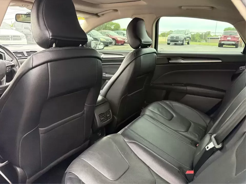 2018 Ford Fusion Titanium AWD (3FA6P0D9XJR) with an 2.0L L4 DOHC 16V engine, 6-Speed Automatic transmission, located at 1951 S Dayton Lakeview Rd., New Carlisle, OH, 45344, (937) 908-9800, 39.890999, -84.050255 - Picture a comfortable, capable sedan that makes daily commutes down I70 feel easy, keeps weekend plans on track, and still looks sharp pulling into dinner in nearby Huber Heights or downtown Dayton. This **2018 Ford Fusion Titanium AWD** is built for real-life driving in Ohio-whether you're navigati - Photo#10