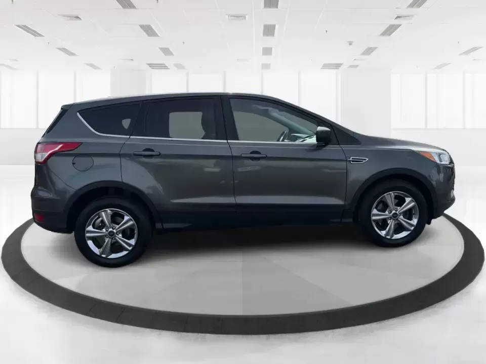 2016 Ford Escape SE (1FMCU0G75GU) with an 2.5L L4 DOHC 16V engine, 6-Speed Automatic transmission, located at 1099 N County Rd 25A , Troy, OH, 45373, (937) 908-9800, 40.057079, -84.212883 - Whether you're juggling school drop-offs, commuting up I75, or planning a weekend run to the Miami County Fairgrounds, this 2016 Ford Escape SE is the kind of practical SUV that fits real-life Troy, Ohio routines. With a versatile cabin, confident road manners, and easy-to-live-with features, it's a - Photo#1