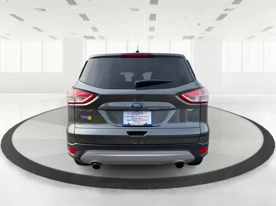 2016 Ford Escape SE (1FMCU0G75GU) with an 2.5L L4 DOHC 16V engine, 6-Speed Automatic transmission, located at 1099 N County Rd 25A , Troy, OH, 45373, (937) 908-9800, 40.057079, -84.212883 - Whether you're juggling school drop-offs, commuting up I75, or planning a weekend run to the Miami County Fairgrounds, this 2016 Ford Escape SE is the kind of practical SUV that fits real-life Troy, Ohio routines. With a versatile cabin, confident road manners, and easy-to-live-with features, it's a - Photo#3