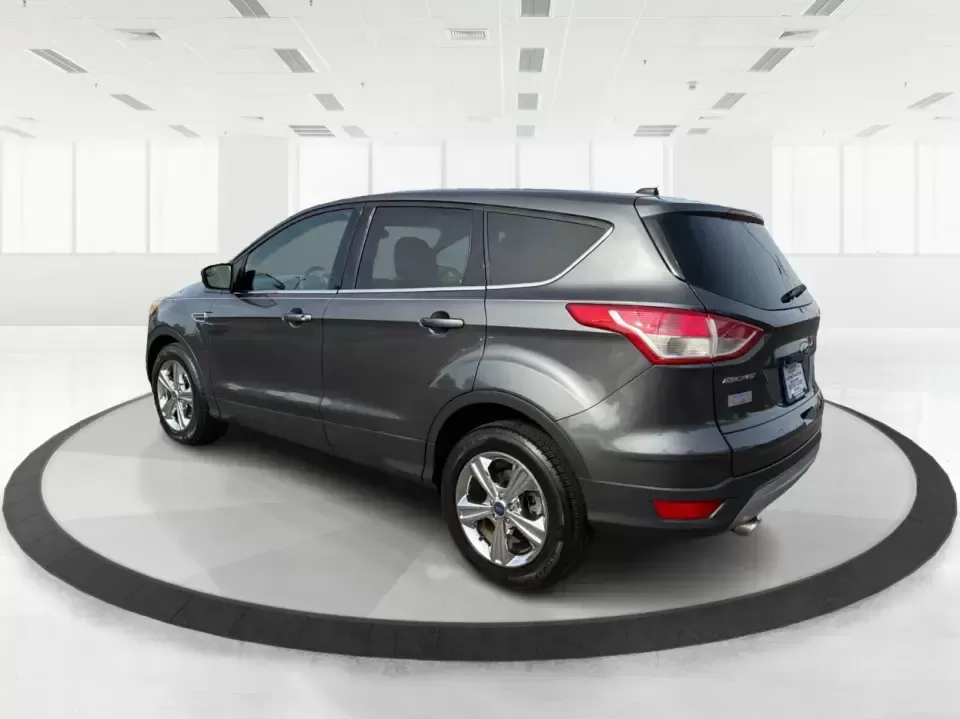 2016 Ford Escape SE (1FMCU0G75GU) with an 2.5L L4 DOHC 16V engine, 6-Speed Automatic transmission, located at 1099 N County Rd 25A , Troy, OH, 45373, (937) 908-9800, 40.057079, -84.212883 - Whether you're juggling school drop-offs, commuting up I75, or planning a weekend run to the Miami County Fairgrounds, this 2016 Ford Escape SE is the kind of practical SUV that fits real-life Troy, Ohio routines. With a versatile cabin, confident road manners, and easy-to-live-with features, it's a - Photo#4