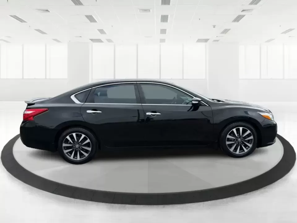2016 Nissan Altima 2.5 SL (1N4AL3AP1GC) with an 2.5L I-4 DOHC engine, CVT transmission, located at 1099 N County Rd 25A , Troy, OH, 45373, (937) 908-9800, 40.057079, -84.212883 - Whether you're a Dayton-area commuter stacking highway miles, a busy parent shuttling kids between school and practice, or a weekend road-trip planner who wants comfort without overspending, this **2016 Nissan Altima 2.5 SL** is built for real life. With a sleek **Super Black** exterior and an upsca - Photo#1