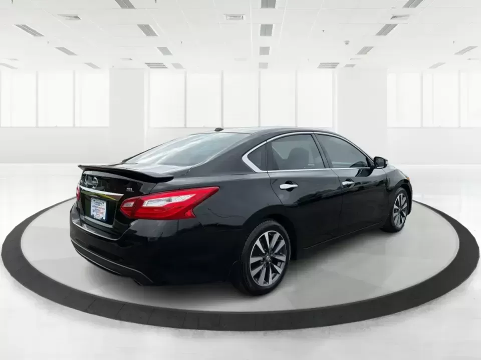 2016 Nissan Altima 2.5 SL (1N4AL3AP1GC) with an 2.5L I-4 DOHC engine, CVT transmission, located at 1099 N County Rd 25A , Troy, OH, 45373, (937) 908-9800, 40.057079, -84.212883 - Whether you're a Dayton-area commuter stacking highway miles, a busy parent shuttling kids between school and practice, or a weekend road-trip planner who wants comfort without overspending, this **2016 Nissan Altima 2.5 SL** is built for real life. With a sleek **Super Black** exterior and an upsca - Photo#2