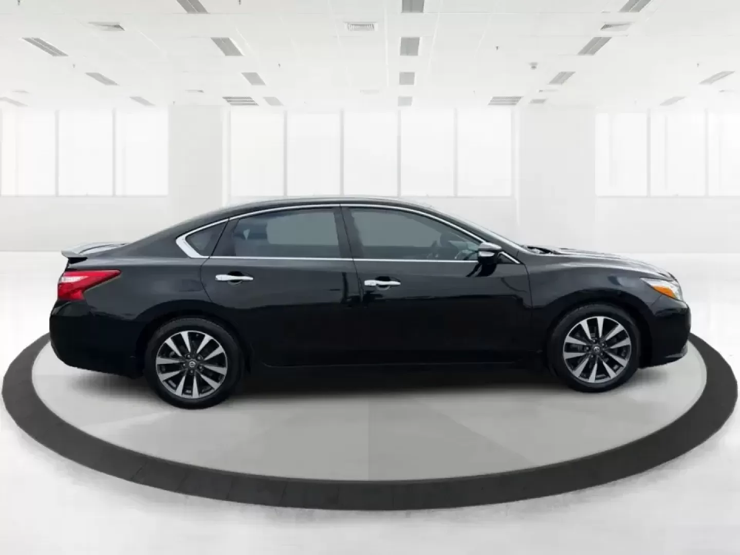 2016 Nissan Altima 2.5 SL (1N4AL3AP1GC) with an 2.5L I-4 DOHC engine, CVT transmission, located at 880 E. National Road, Vandalia, OH, 45377, (937) 908-9800, 39.891918, -84.183594 - Whether you're a Dayton-area commuter stacking highway miles, a busy parent shuttling kids between school and practice, or a weekend road-trip planner who wants comfort without overspending, this **2016 Nissan Altima 2.5 SL** is built for real life. With a sleek **Super Black** exterior and an upsca - Photo#1
