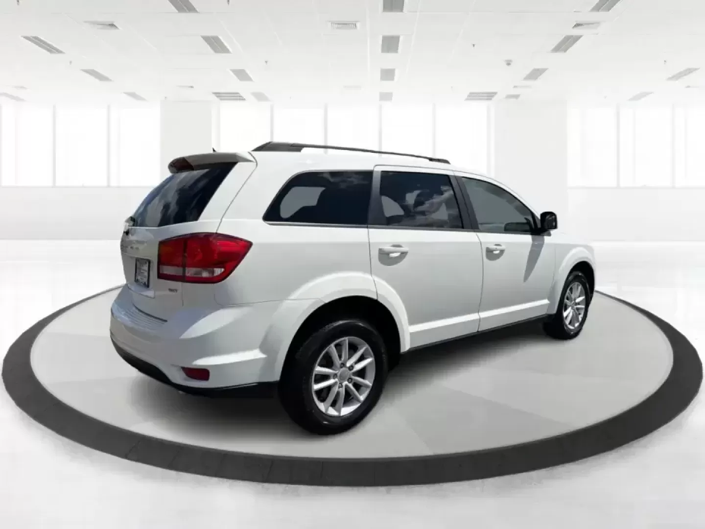 2014 Dodge Journey SXT (3C4PDDBG1ET) with an 3.6L V-6 DOHC engine, 6-Speed Automatic transmission, located at 880 E. National Road, Vandalia, OH, 45377, (937) 908-9800, 39.891918, -84.183594 - Pack up the kids, queue up a playlist, and head out for a weekend getaway-this 2014 Dodge Journey SXT is built for real-life schedules and real-life adventures. Whether you're shuttling to practice, commuting up I-75, or planning a road trip from Vandalia to the National Museum of the U.S. Air Force - Photo#2
