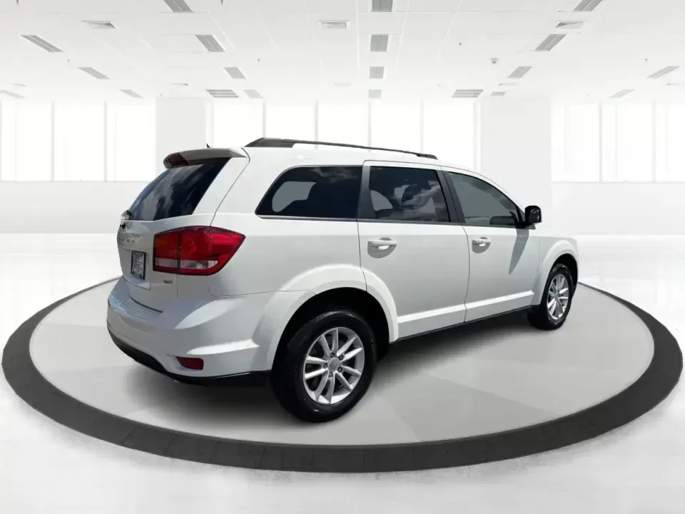 2014 Dodge Journey SXT (3C4PDDBG1ET) with an 3.6L V-6 DOHC engine, 6-Speed Automatic transmission, located at 880 E. National Road, Vandalia, OH, 45377, (937) 908-9800, 39.891918, -84.183594 - Pack up the kids, queue up a playlist, and head out for a weekend getaway-this 2014 Dodge Journey SXT is built for real-life schedules and real-life adventures. Whether you're shuttling to practice, commuting up I-75, or planning a road trip from Vandalia to the National Museum of the U.S. Air Force - Photo#2