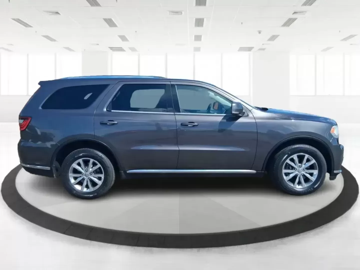 2015 Dodge Durango Limited (1C4RDJDG7FC) with an 3.6L V6 DOHC 24V engine, 8-Speed Automatic transmission, located at 880 E. National Road, Vandalia, OH, 45377, (937) 908-9800, 39.891918, -84.183594 - Pack up the kids, load the cargo, and point the nose toward your next weekend getaway-this 2015 Dodge Durango Limited is built for real life in West Central Ohio. Whether you're shuttling a growing family to practice, commuting up I75, or planning a road trip to Indian Lake, the Durango delivers the - Photo#1